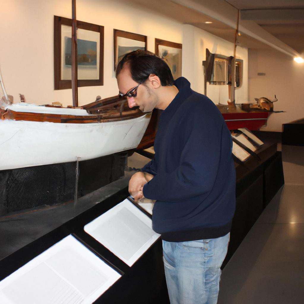 Person arranging museum ship exhibition